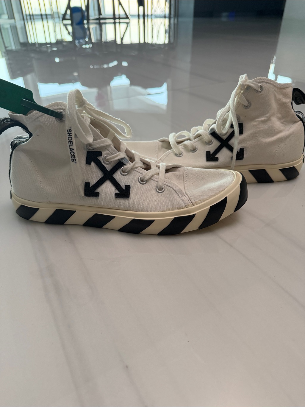 Off-White- Men’s White High-Top Sneakers With Black Arrow Motif